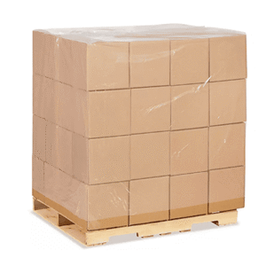 Full pallet of cardboard boxes wrapped with transparent stretch film by automatic pallet wrapping machine