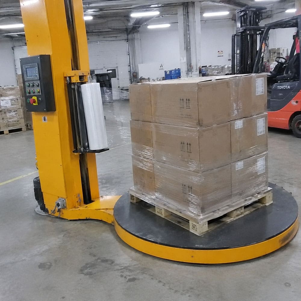 Choosing a pallet wrapping machine for an industrial workflow pallet wrapping machine selection based on loads and throughput
